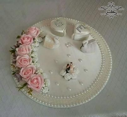 تزیین جای انگشتر حلقه عروس داماد عقد نامزدی بله برون تزیین جای انگشتر حلقه عروس داماد عقد نامزدی بله برون