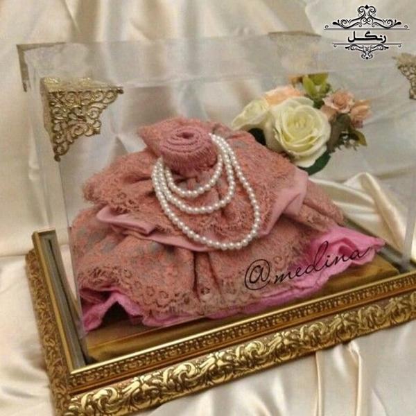 مدل تزیین پارچه و خلعتی عروس داماد بله برون و هدیه