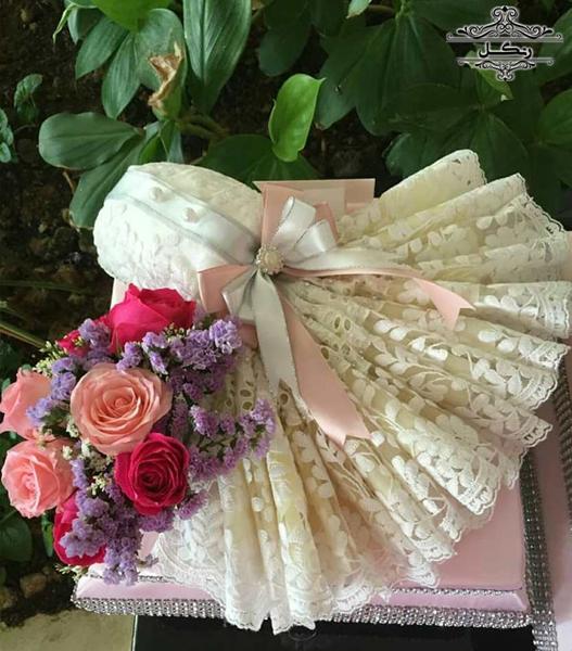 مدل تزیین پارچه و خلعتی عروس داماد بله برون و هدیه