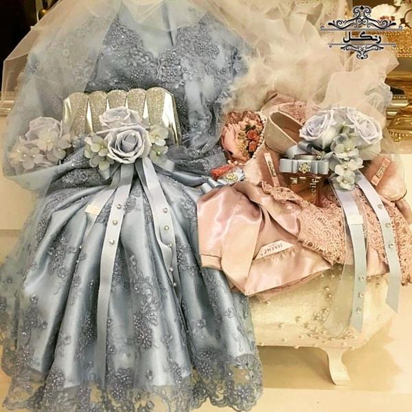 مدل تزیین پارچه و خلعتی عروس داماد بله برون و هدیه