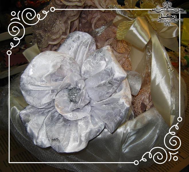 مدل تزیین پارچه و خلعتی عروس داماد بله برون و هدیه