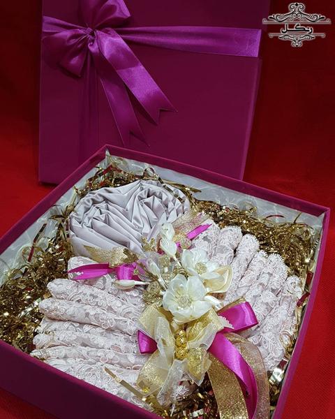 مدل تزیین پارچه و خلعتی عروس داماد بله برون و هدیه