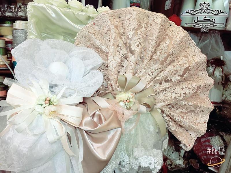 مدل تزیین پارچه و خلعتی عروس داماد بله برون و هدیه