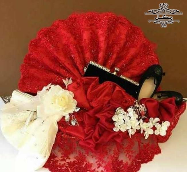 مدل تزیین پارچه و خلعتی عروس داماد بله برون و هدیه