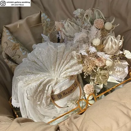 تزیین پارچه خلعتی بله برون دیزاین لباس پارچه عروس