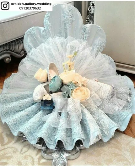 تزیین پارچه خلعتی بله برون دیزاین لباس پارچه عروس